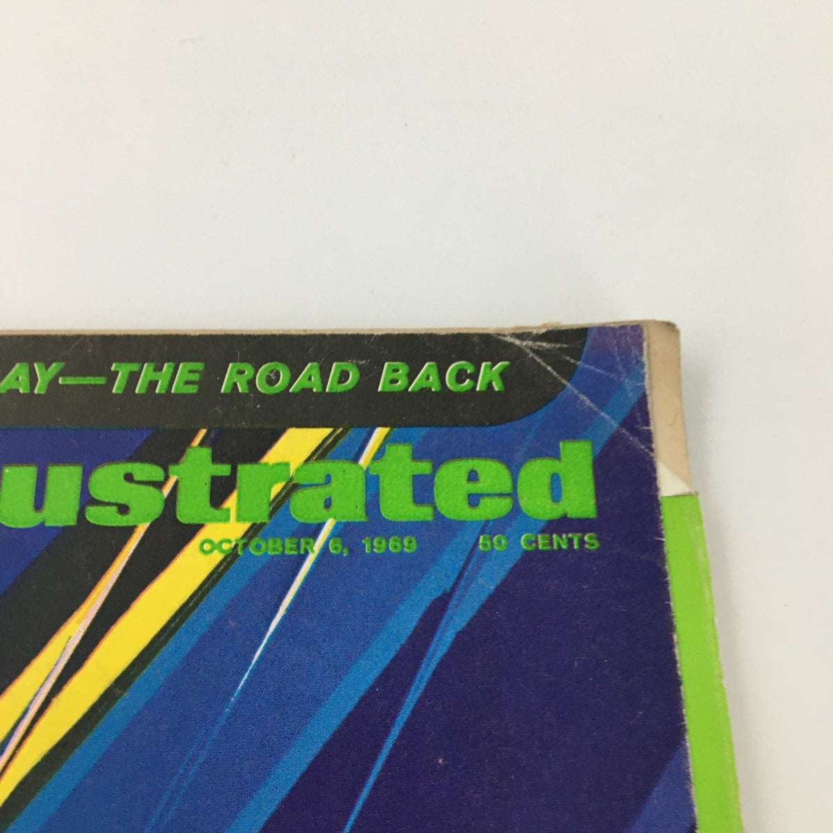 Close-up of the VTG Sports Illustrated Magazine's top cover detailing, including title and date, October 6, 1969.