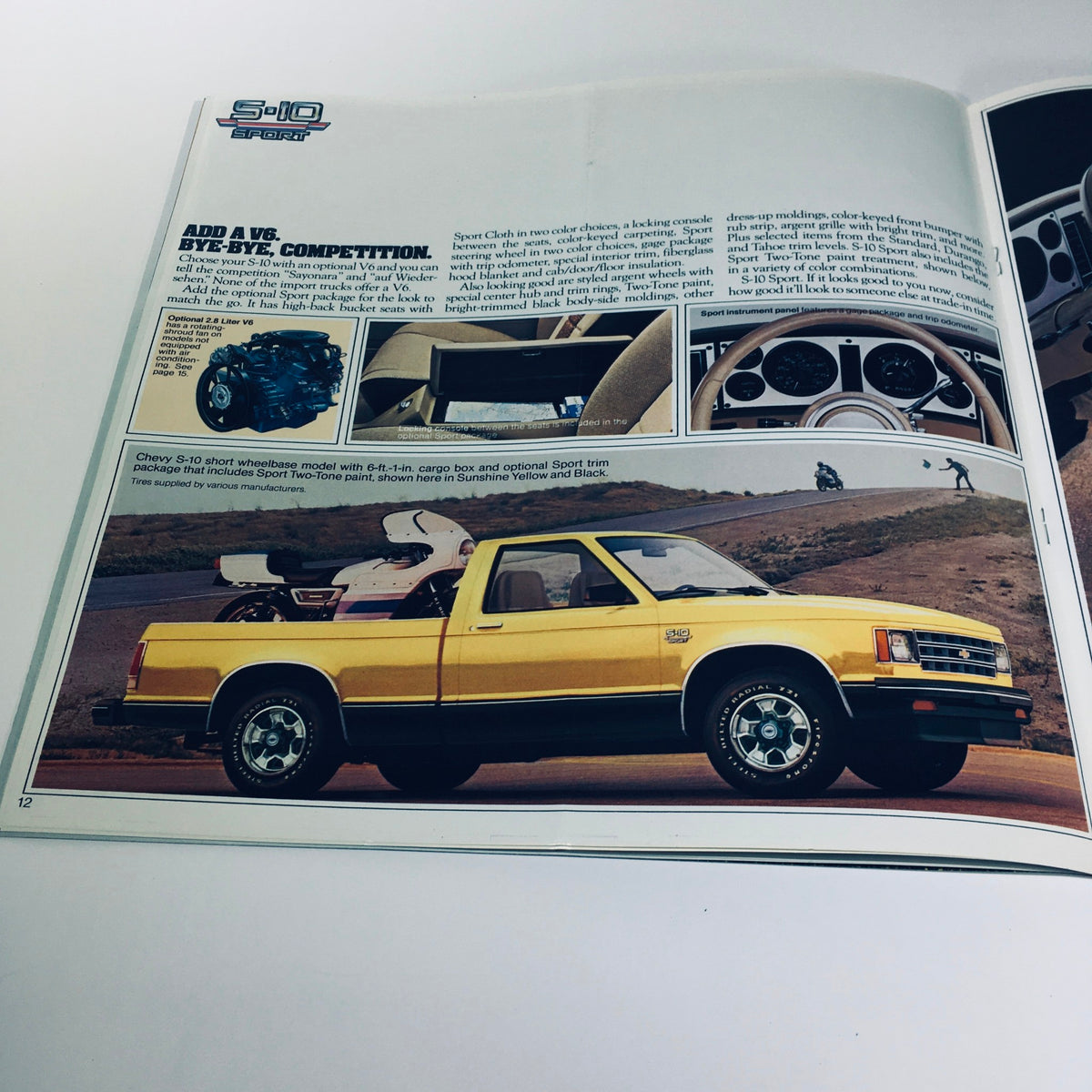 Page 12 of the September 1981/4099 Chevy Trucks S-10 Tahoe Durango Sport Car Catalog featuring the yellow S-10 truck and its specifications.
