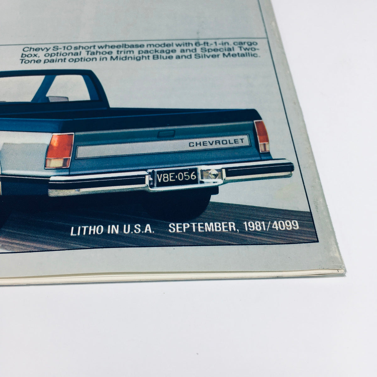 Rear view of a Chevy S-10 short wheelbase model from the September 1981/4099 Chevy Trucks S-10 Tahoe Durango Sport Car Catalog Brochure, featuring the Chevrolet emblem and available color options.