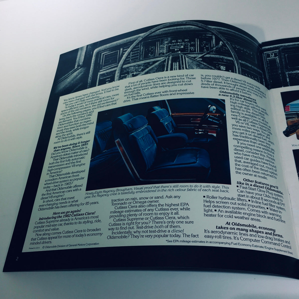 Interior page of the 1982 Oldsmobile Tornado Ninety-Eight Delta 88 Wagons Car Sales Brochure showcasing seating and dashboard details with descriptive text.