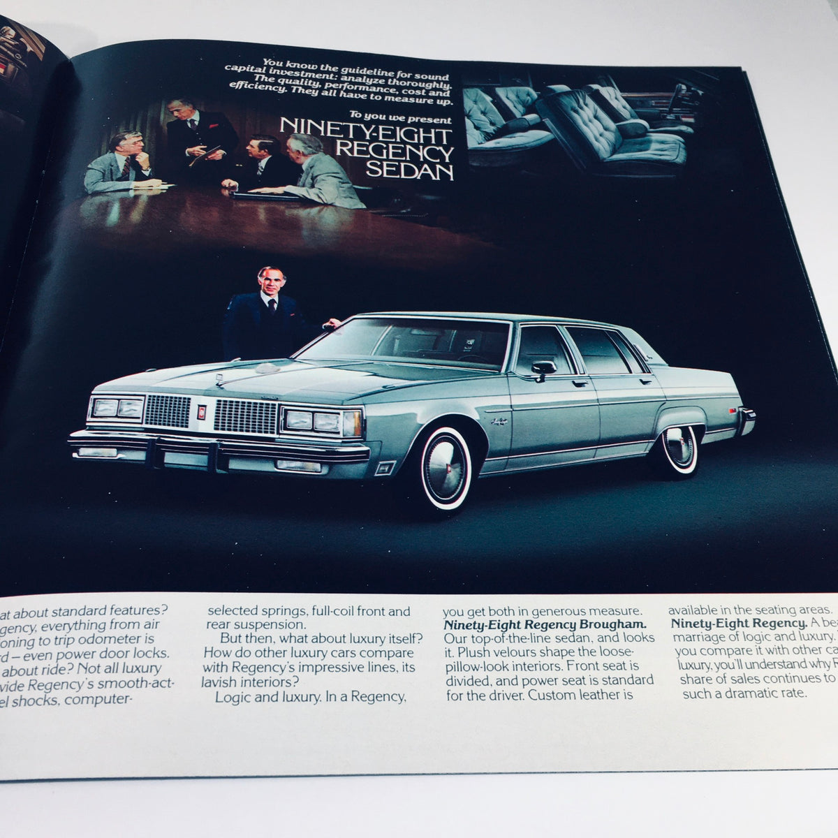 1982 Oldsmobile Tornado Ninety-Eight Delta 88 Wagons Car Sales Brochure showcasing the Ninety-Eight Regency Sedan with a businessman and details on luxury features and specifications.