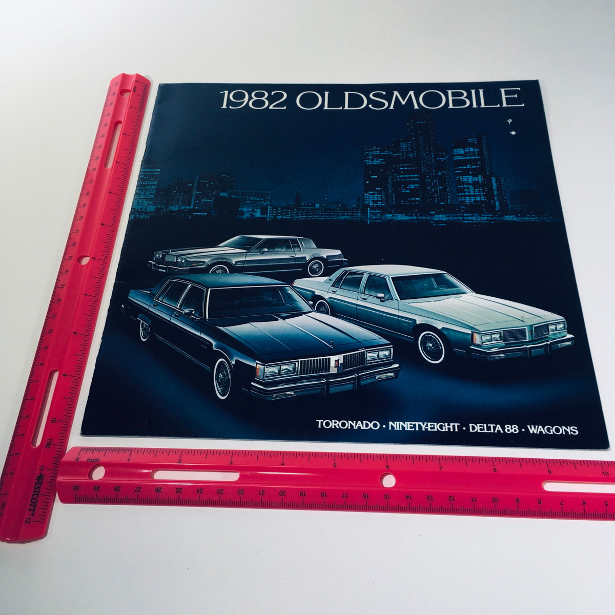 1982 Oldsmobile Tornado Ninety-Eight Delta 88 Wagons Car Sales Brochure front cover presenting the title and images of the cars, emphasizing the variety of luxury options available.