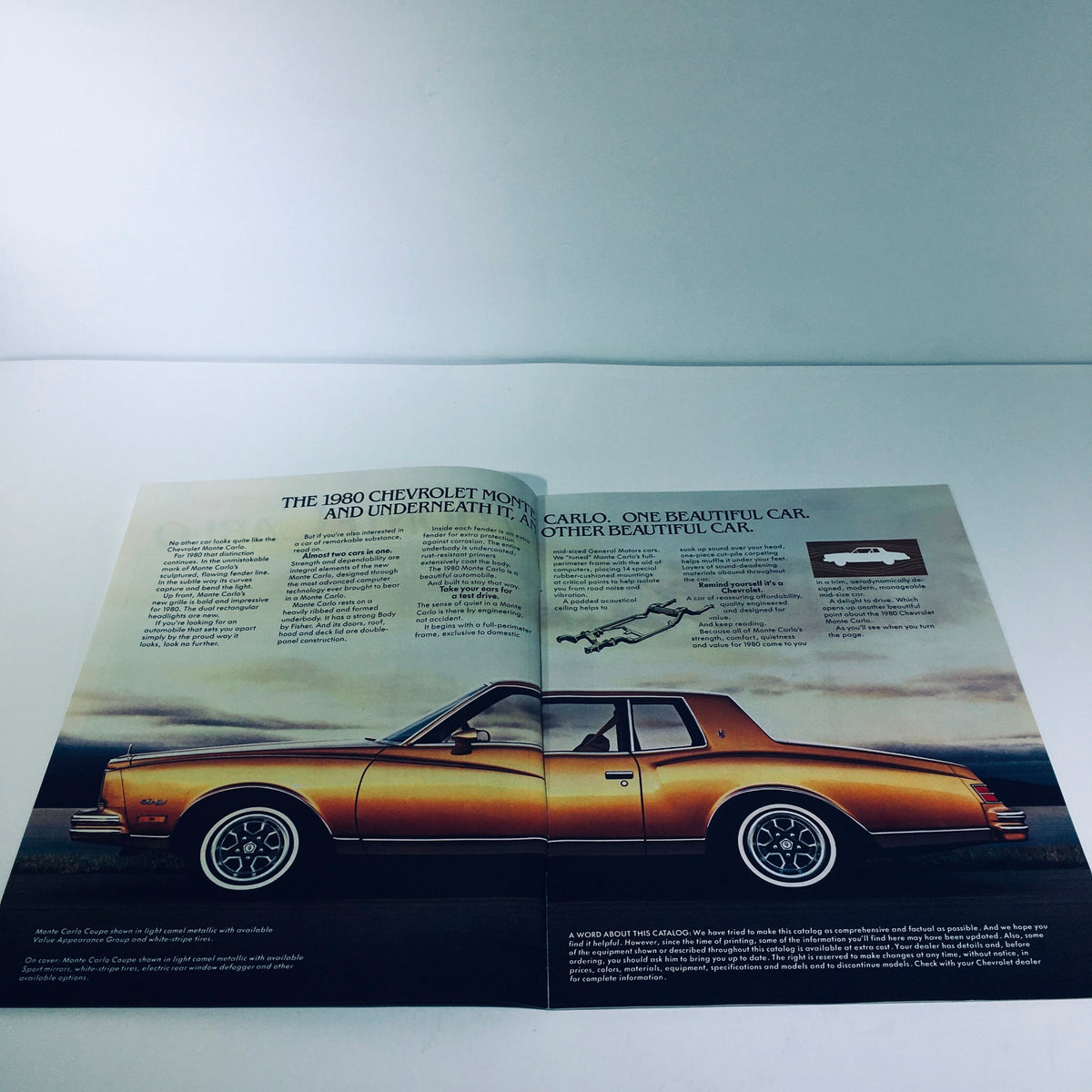 Inside spread of the 1980 Chevrolet Monte Carlo Turbocharge V6 brochure highlighting the car's features, beautifully designed alongside scenic imagery.