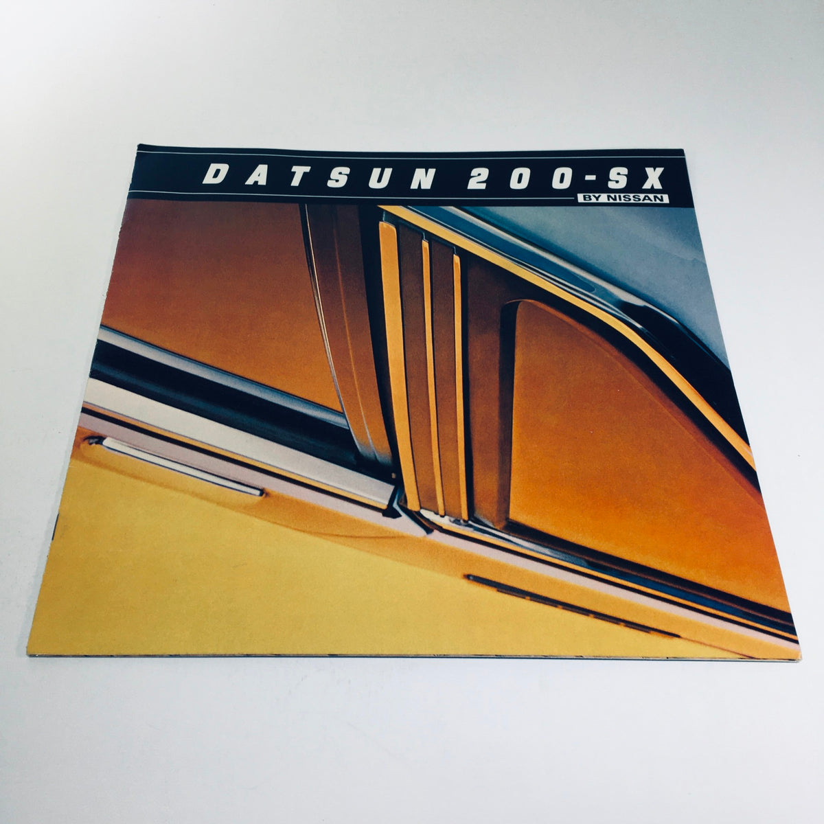 Cover of the 1981 Datsun 200-SX by Nissan Fuel Injected NAPS-Z Car Sale Brochure, featuring a stylish design with a focus on the car's exterior details.