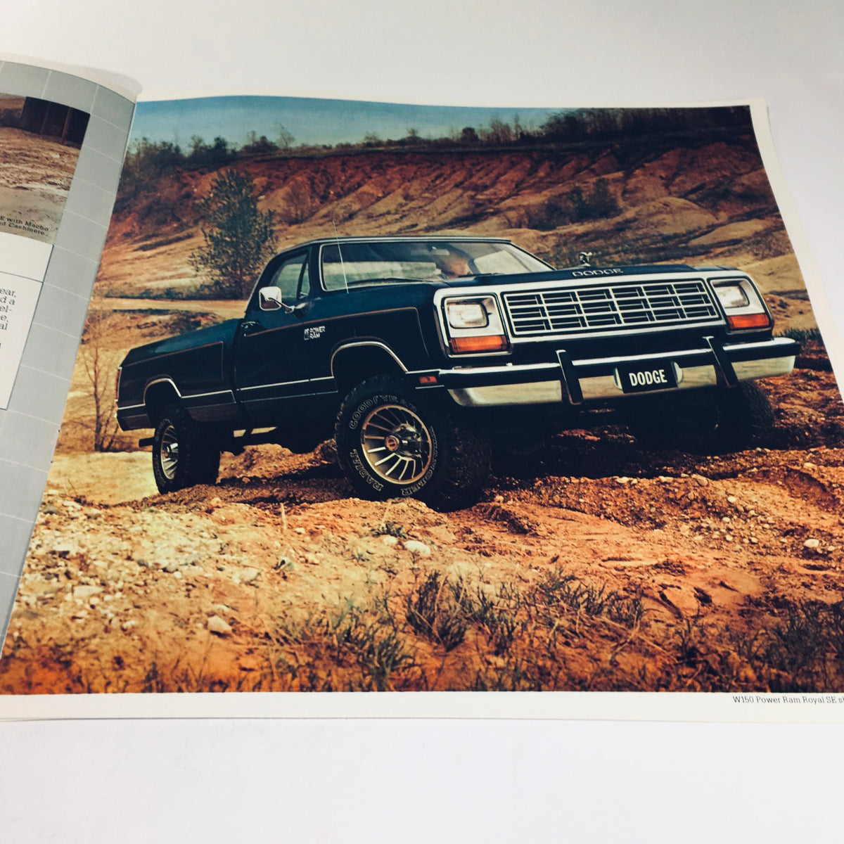 1981 Dodge Pickups D350 Crew Cab Ram Royal Two-Barrel V-8 Engine Car Brochure page featuring a green D350 Power Ram truck on a dirt terrain, emphasizing its robust style and capability.