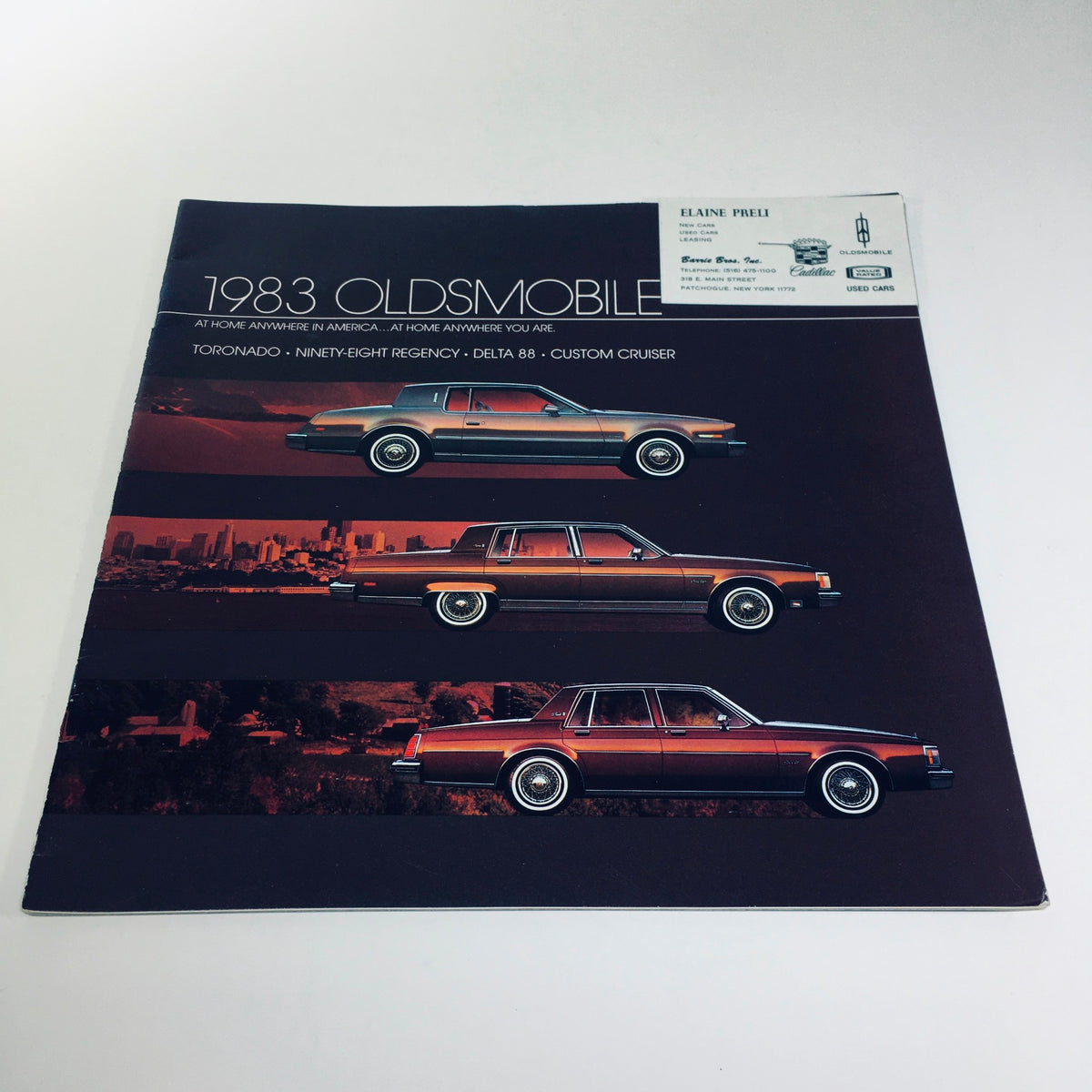 1983 Oldsmobile Toronado Ninety-Eight Regency Delta 88 Custom Car Brochure showcasing a stylish cover design with images of the featured cars.