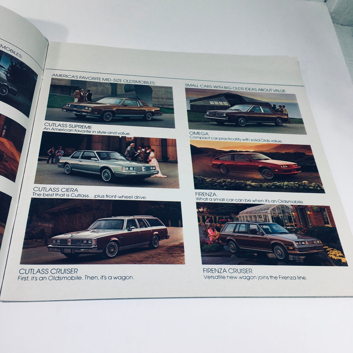 Another interior page from the 1983 Oldsmobile Toronado Ninety-Eight Regency Delta 88 Custom Car Brochure, featuring ads for various Oldsmobile models.