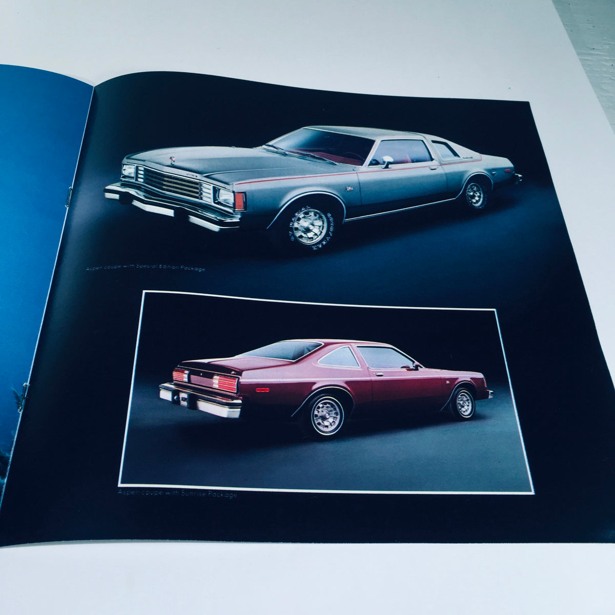 1980 Dodge Aspen Coupe Optional T-Bar Roof Compact Car Sale Brochure displaying two models of the Dodge Aspen, showcasing distinct angles and styles.