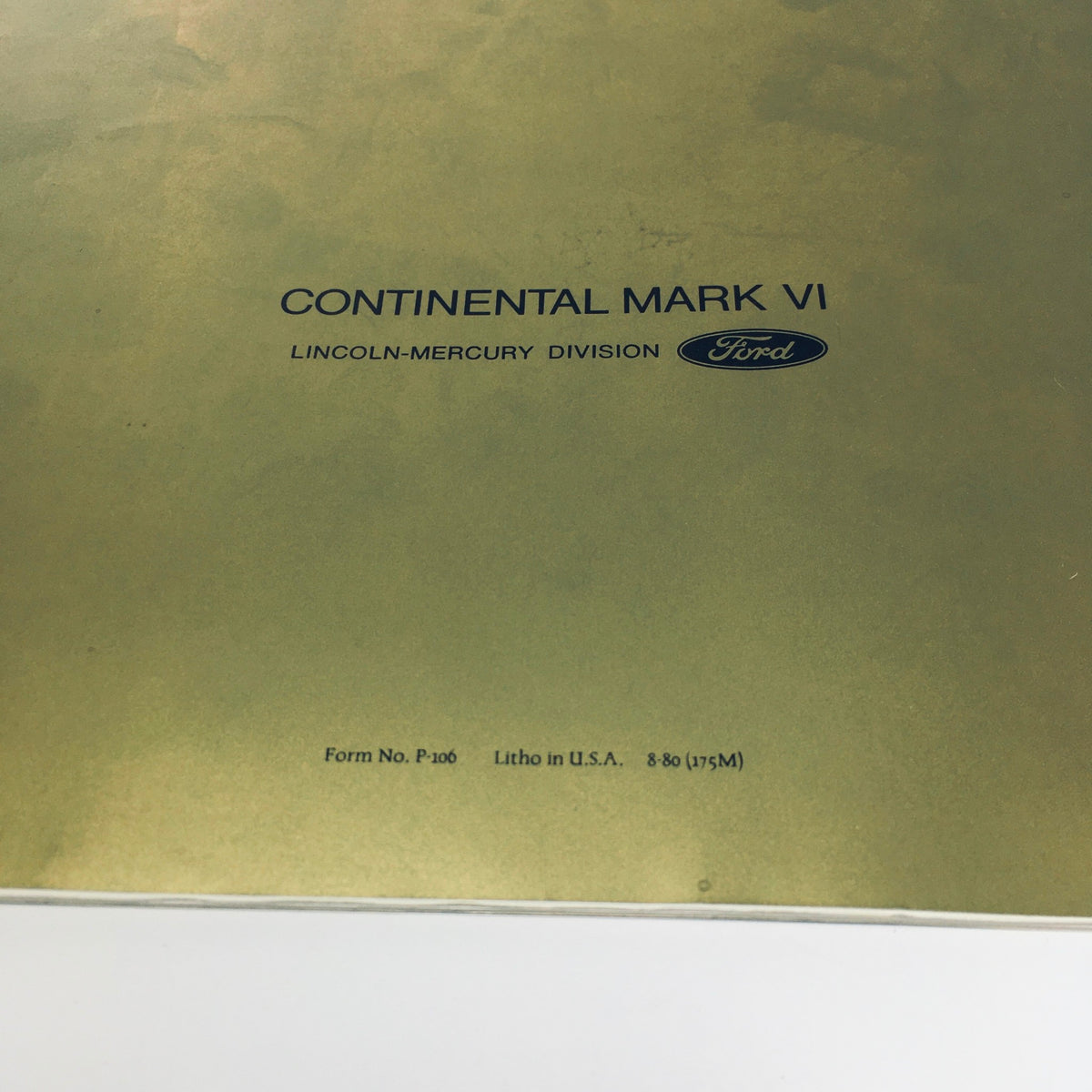 Close-up view of the back cover of the 1981 Continental Mark VI Signature Series Form No. P-100 Car Sale Brochure, featuring the Continental Mark VI logo from Lincoln-Mercury Division of Ford.