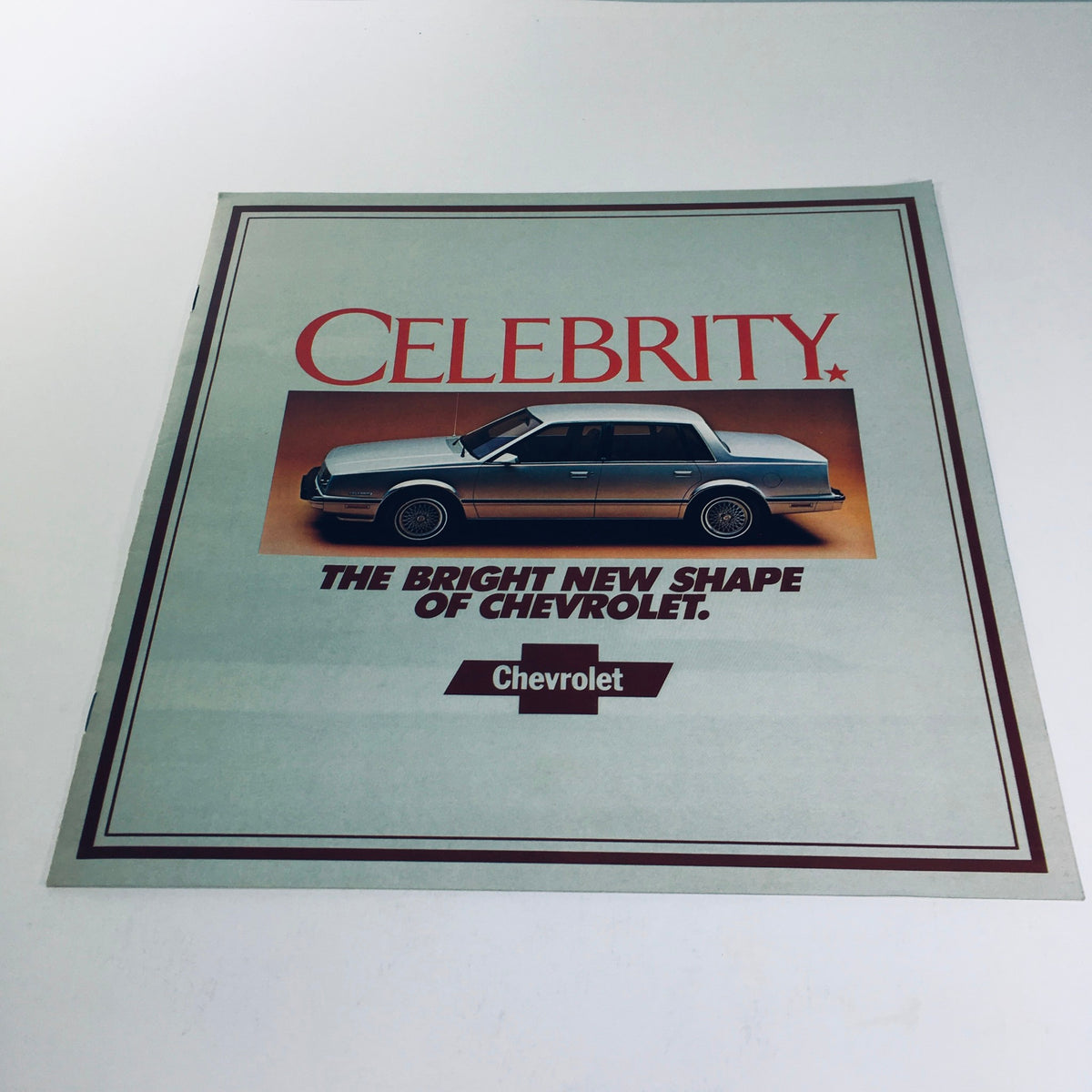 October 1981 Chevrolet Celebrity Your Taste of Luxury 4084 Car Sale Brochure showcasing the bright new shape of Chevrolet, featuring an elegant silver Chevy Celebrity on the cover.