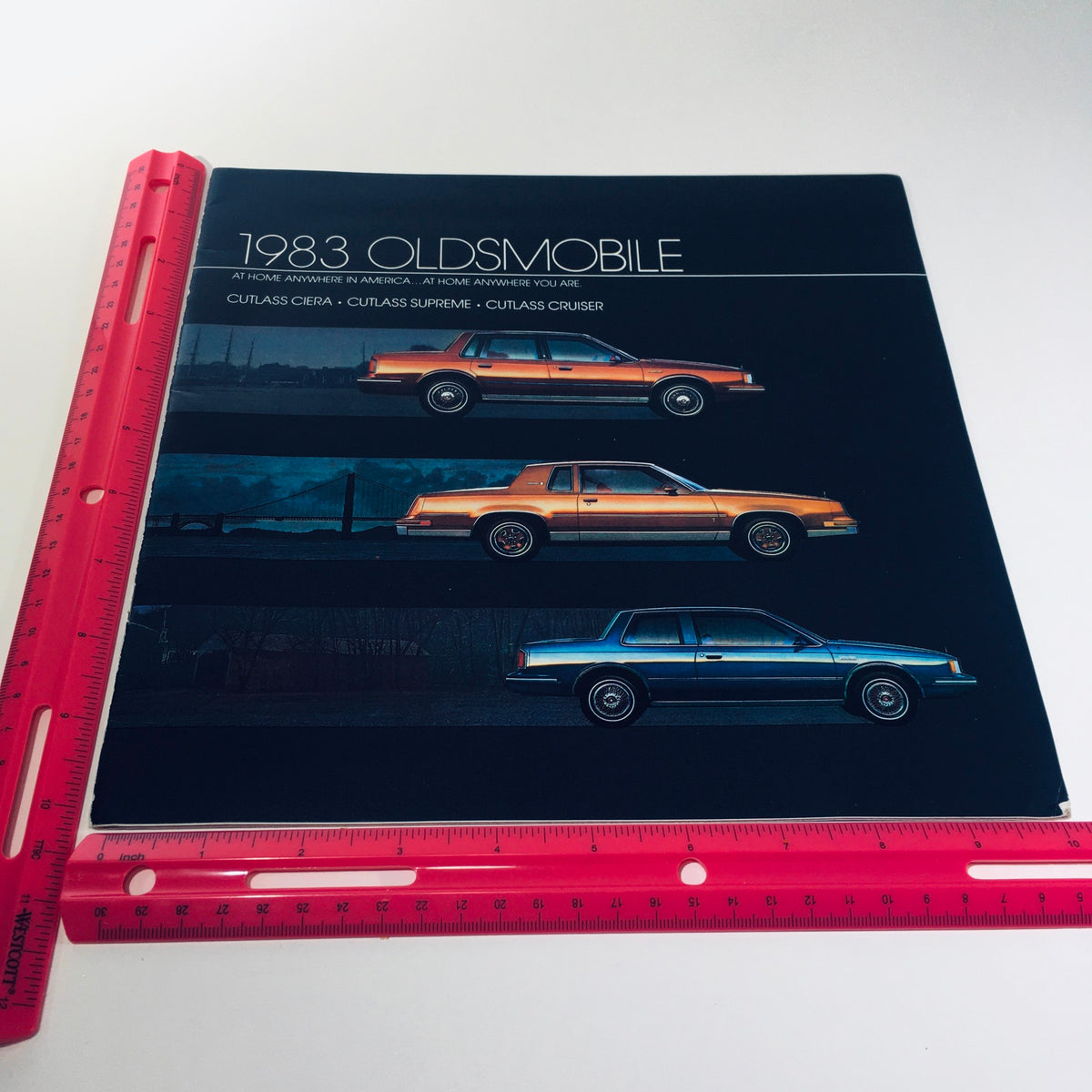 1983 Oldsmobile Cutlass Ciera, Supreme & Cruiser (110 Cid) L4 EFI Car Brochure front cover displaying illustrations of various Oldsmobile models with the title prominently featured.