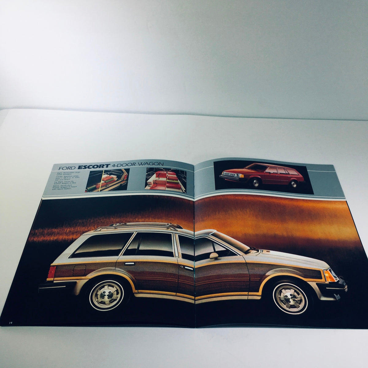 1982 Ford Escort GL Series 2-Door Hatchback showcased in a Ford Division brochure, featuring a wood-paneled design with images of a 4-door wagon.