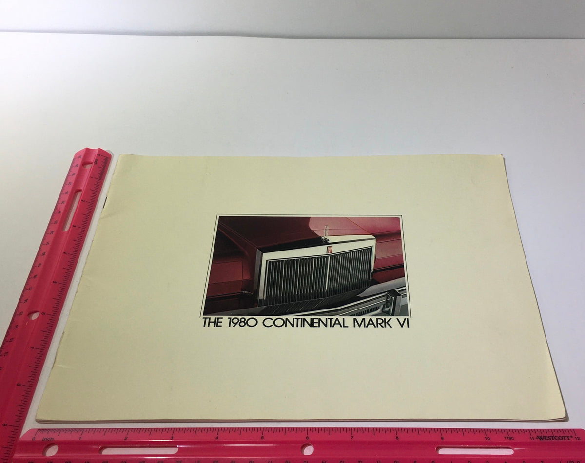 Front cover of the 1980 Pucci Designer Continental Series Mark VI Car Sale Brochure, illustrating the iconic grille of the Mark VI model.