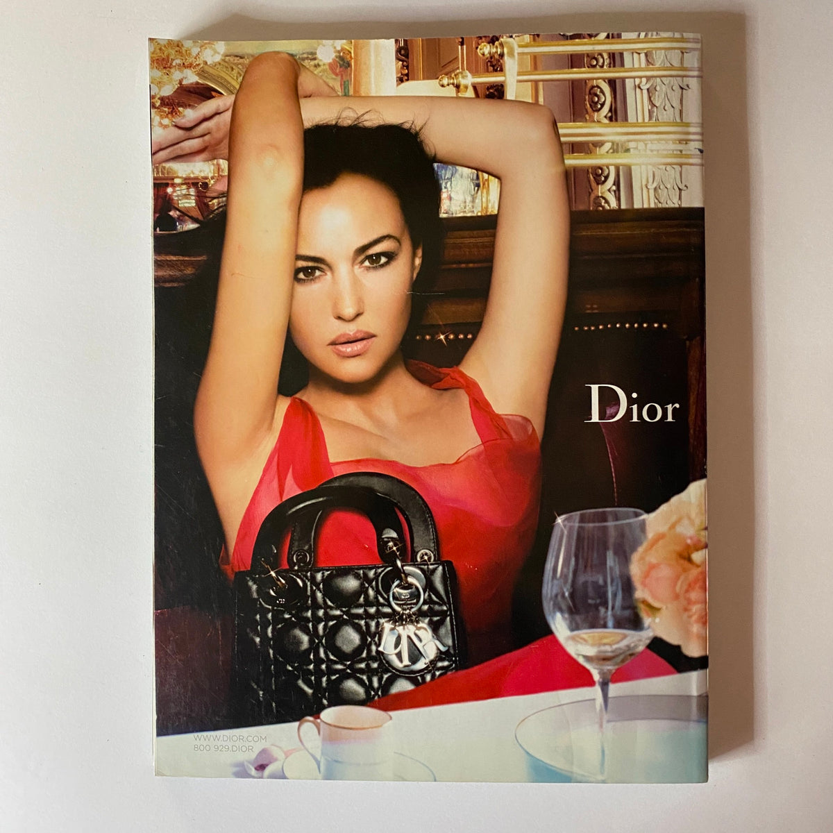 Back cover of Elle Magazine December 2006 featuring a stylish Dior advertisement with a model and a fashionable handbag.