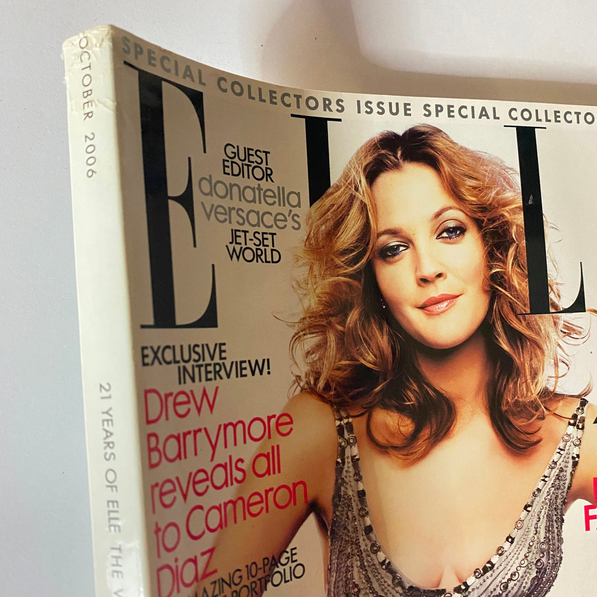 Elle UK Magazine October 2006 cover featuring Drew Barrymore, showcasing her iconic hairstyle and fashion, emphasizing the vintage appeal of this collectible.