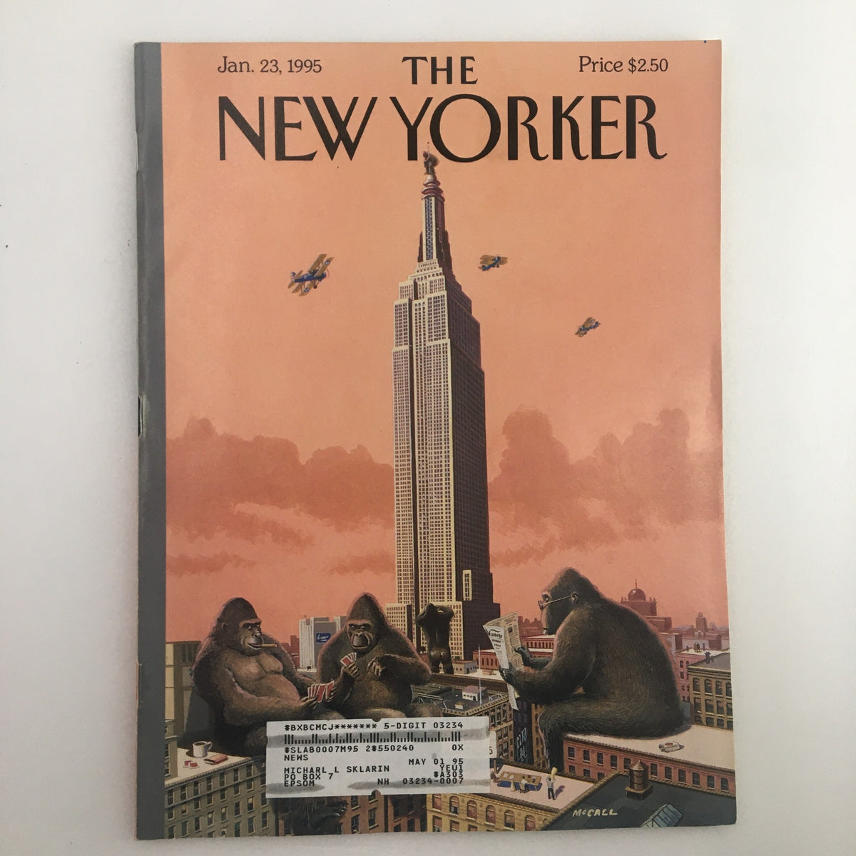 Cover of The New Yorker Full Magazine January 23 1995 titled 'King Kong Call' by Bruce McCall featuring a cartoon of gorillas in front of the Empire State Building with an orange sky backdrop.