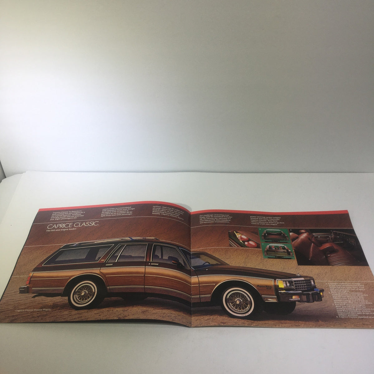 1983 Chevrolet Specialty People-Carriers Caprice Classic V-8 Engine car brochure opened to highlight the interior layout and design details of the Caprice Classic.