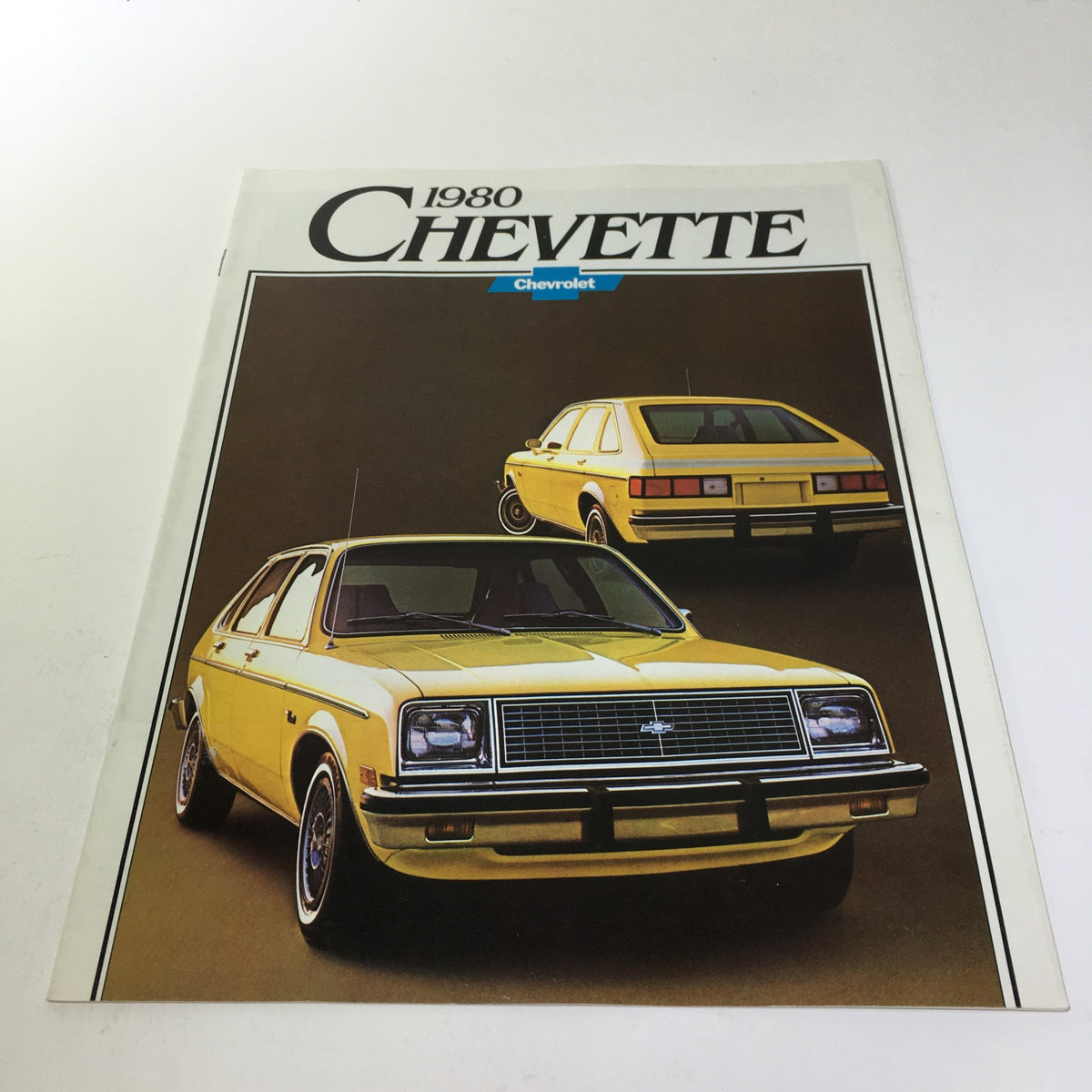 1980 Chevrolet Chevette brochure cover featuring the front and rear view of a yellow Chevette car.