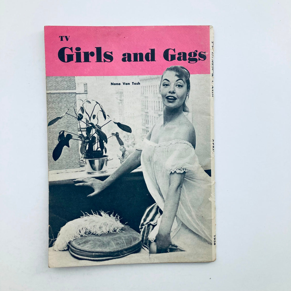Back cover of VTG TV Girls and Gags Magazine April 1958 Vol 5 No. 1 featuring a vintage photo of model Nona Van Tosh, enhancing the magazine's nostalgic appeal.