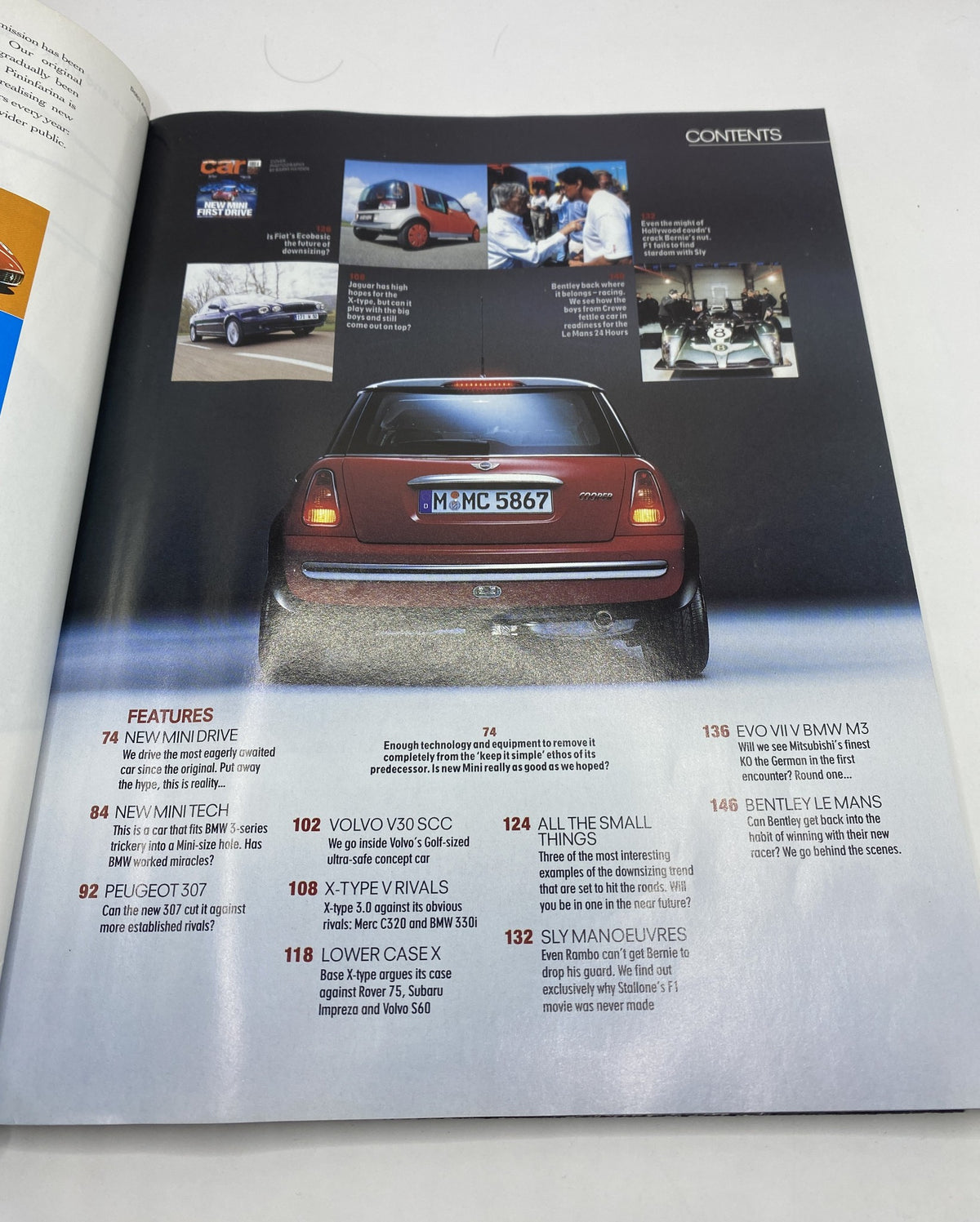 Table of Contents from Car Magazine June 2001, detailing features including New Mini Drive, Jaguar X-Type, and Peugeot 307, with images and article highlights.