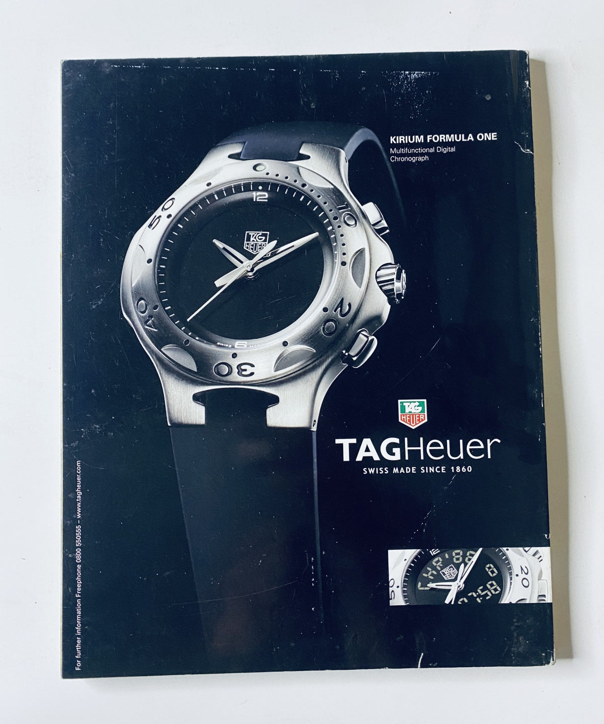TAG Heuer advertisement featuring the Kirium Formula One watch, a digital chronograph showcasing Swiss craftsmanship, included in CAR Magazine December 2001 Performance Car of the Year issue.