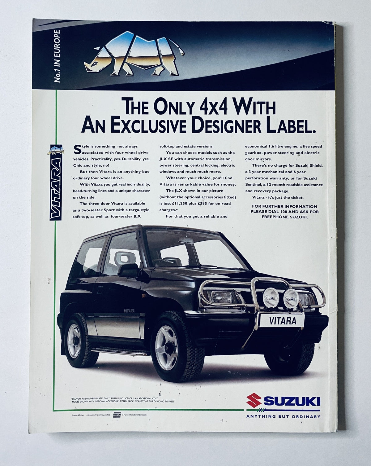Advertisement page from Car Magazine February 1994 showcasing the Suzuki Vitara, emphasizing its exclusive designer label. Part of the magazine’s promotional content.