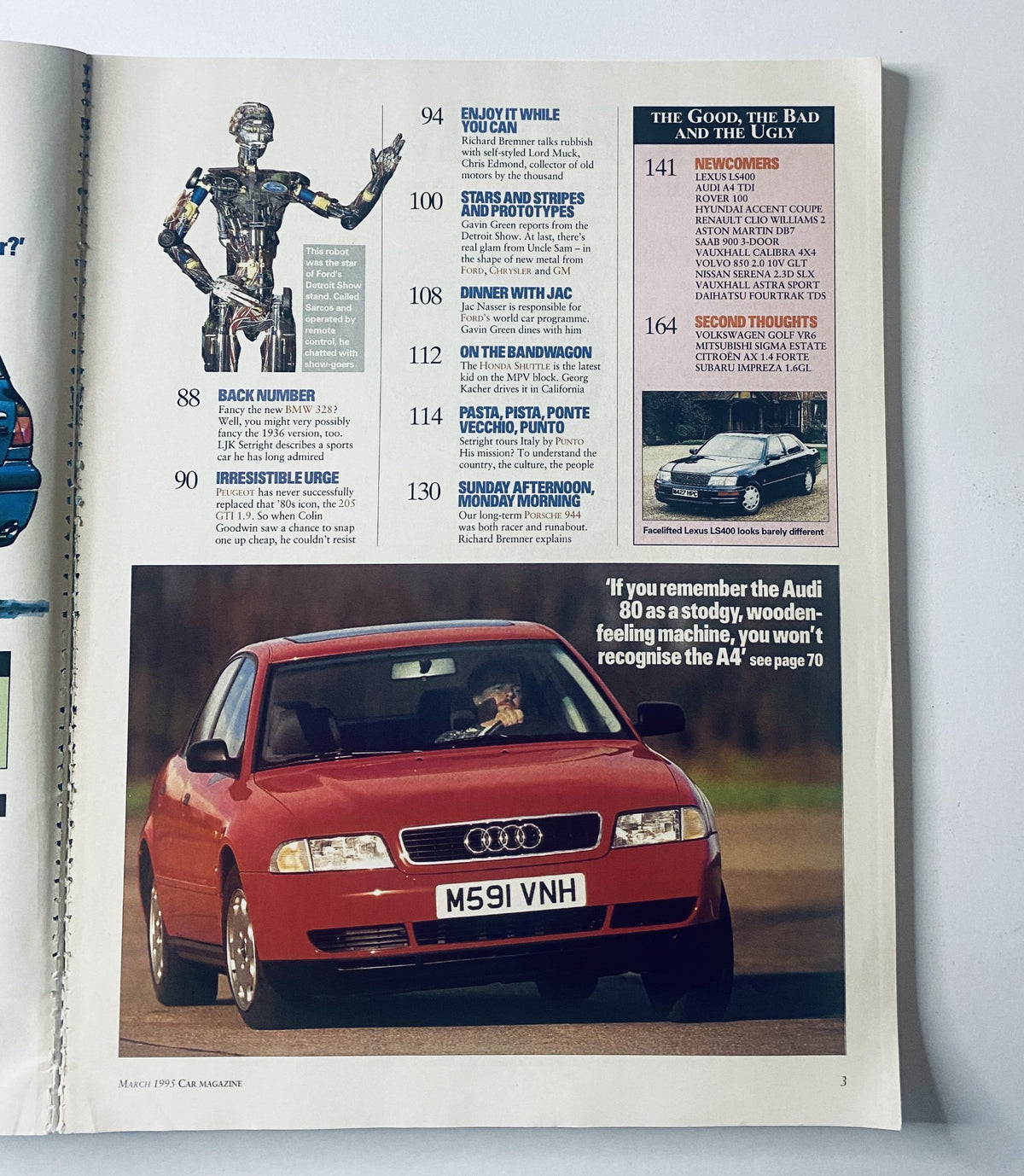 Audi A4 featured in Car Magazine March 1995, showcasing a sedan in red, discussing its comparison to other vehicles including the BMW 328i.