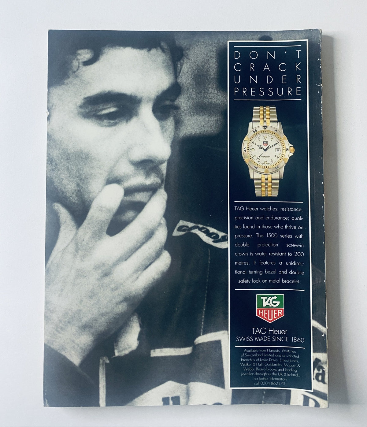 Back cover of Car Magazine July 1992 featuring an advertisement for TAG Heuer watches, emphasizing durability and luxury.