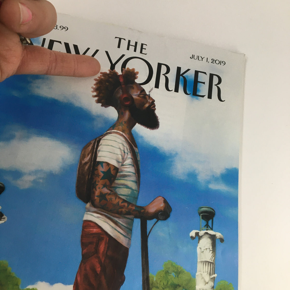 Close-up view of The New Yorker July 1 2019 Magazine Cover highlighting the illustration of a man with a beard and trendy outfit, created by Kadir Nelson.