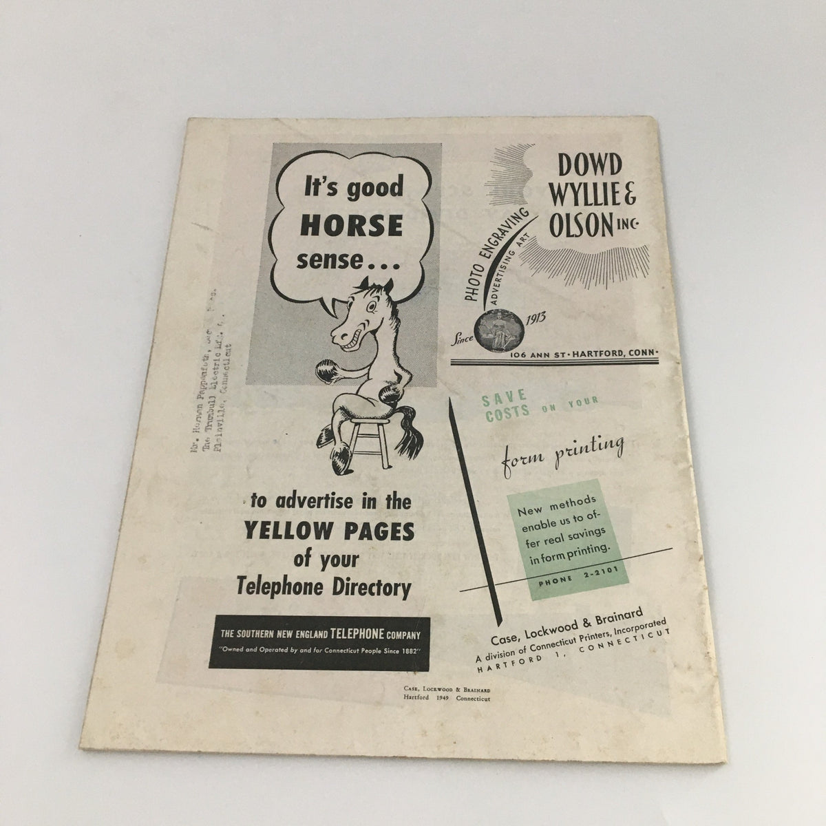 Back cover of VTG Connecticut Industry Magazine June 1949 showcasing advertisements including a humorous horse graphic promoting Yellow Pages.