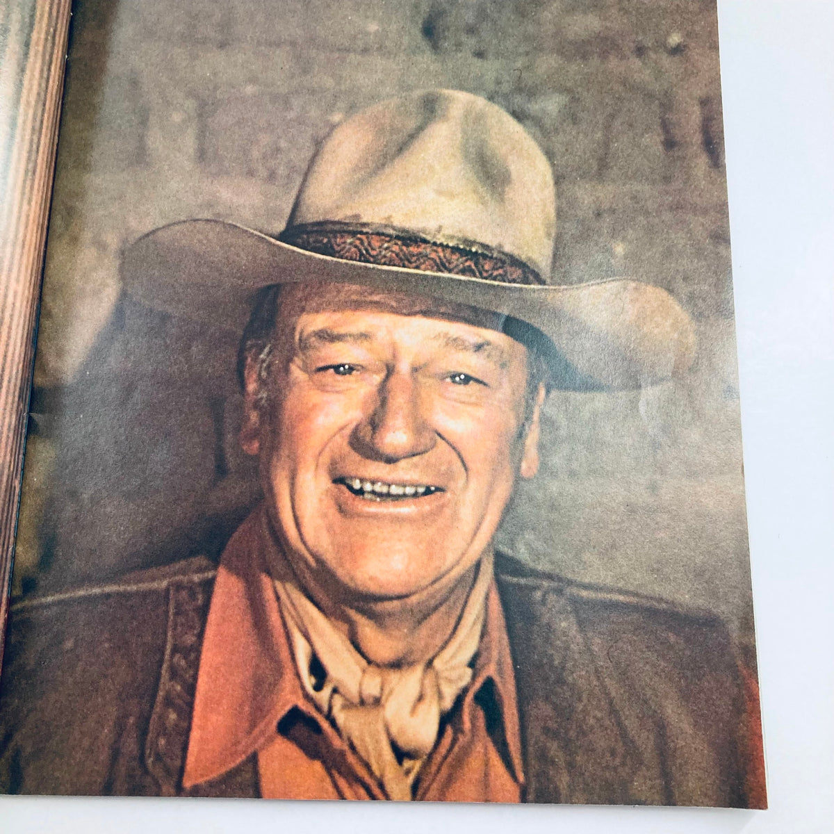 Another inside page of VTG 1979 A Tribute To John Wayne The Duke magazine showing John Wayne smiling in a cowboy hat.