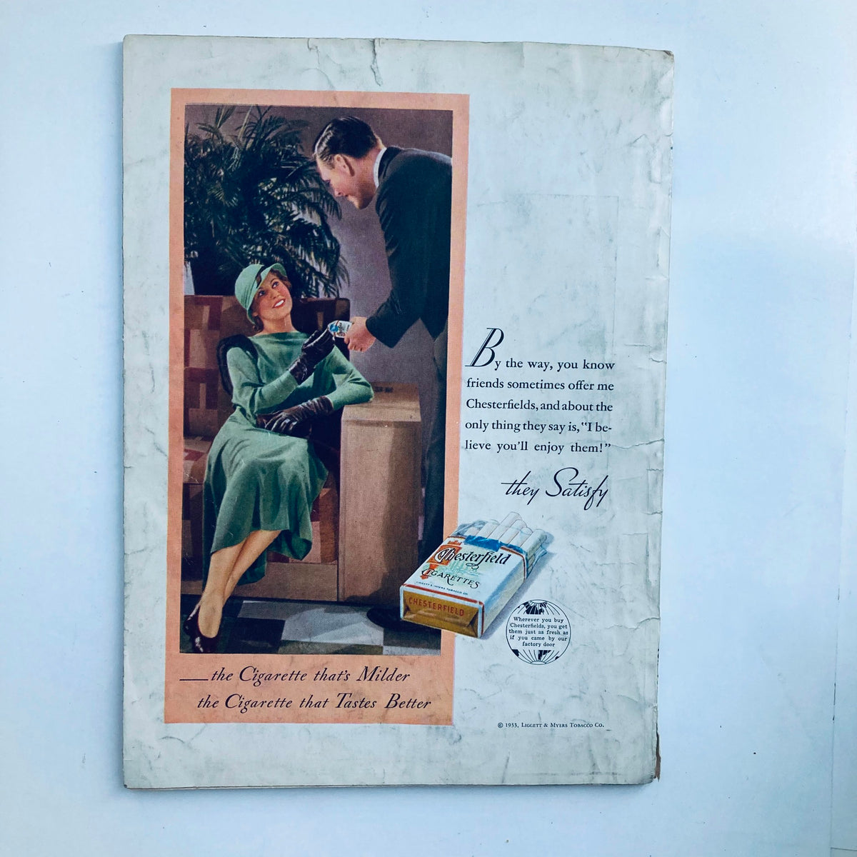 Back cover of VTG Movie Mirror Magazine April 1933 Vol 3 No. 6 with an advertisement for Chesterfield cigarettes featuring a chic lady and a gentleman.