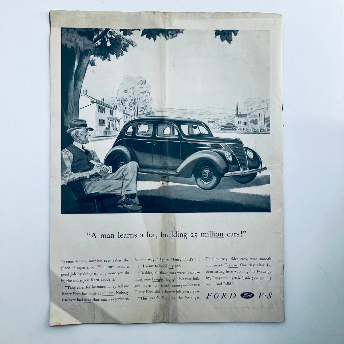 Vintage advertisement from VTG Columbia Magazine July 1937, featuring an illustration of an older man sitting under a tree with a classic Ford V-8 car parked nearby, emphasizing craftsmanship and experience in car manufacturing.