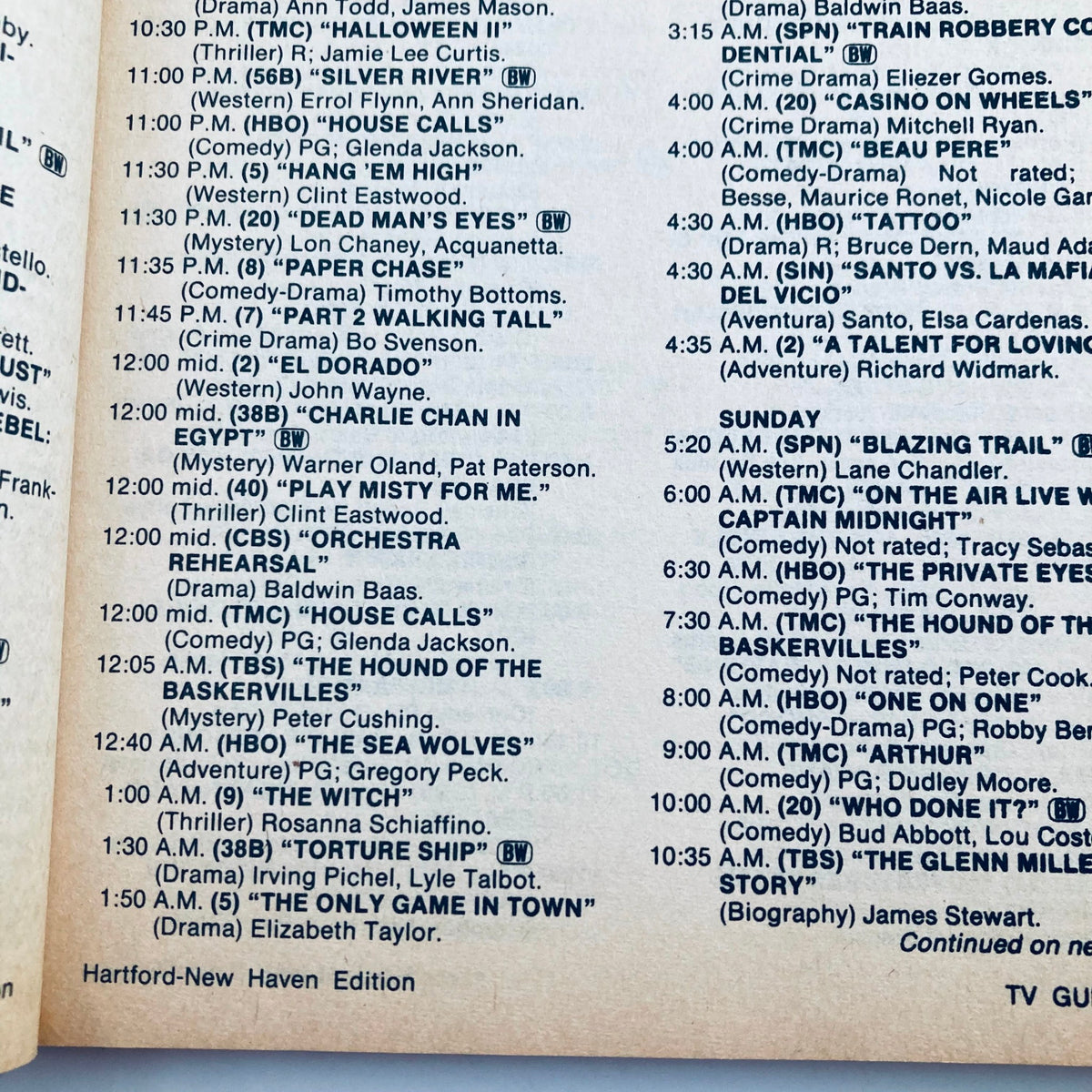 Inside page of TV Guide Magazine October 23, 1982 showcasing the television schedule for Hartford-New Haven Edition, including listings for various movies and shows like 'Halloween II' and 'The Witch'.