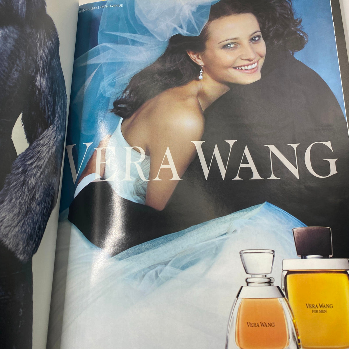 Vera Wang advertisement from the W Magazine October 2006 issue showcasing a model in a bridal gown and perfume products, emphasizing luxury fashion.
