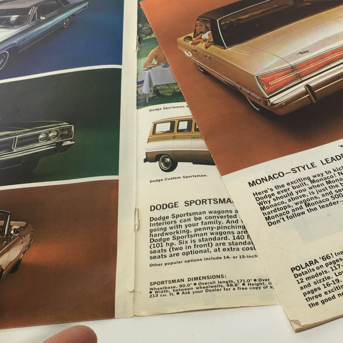 Interior pages of the 1966 Dodge Monaco Polara Coronet Dart brochure showcasing Dodge Custom Sportsman wagons and detailing available features.