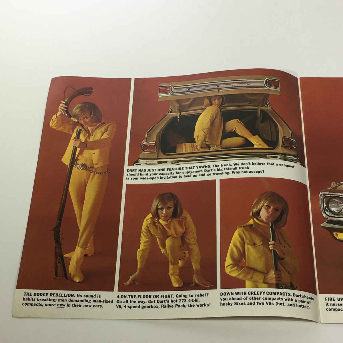 1966 Dodge Dart V-8 Engine 4-Speed Gearbox 2-Door Sedan Car Sale Brochure featuring a woman in a yellow outfit posing with a vintage Dodge Dart car in a studio setting.