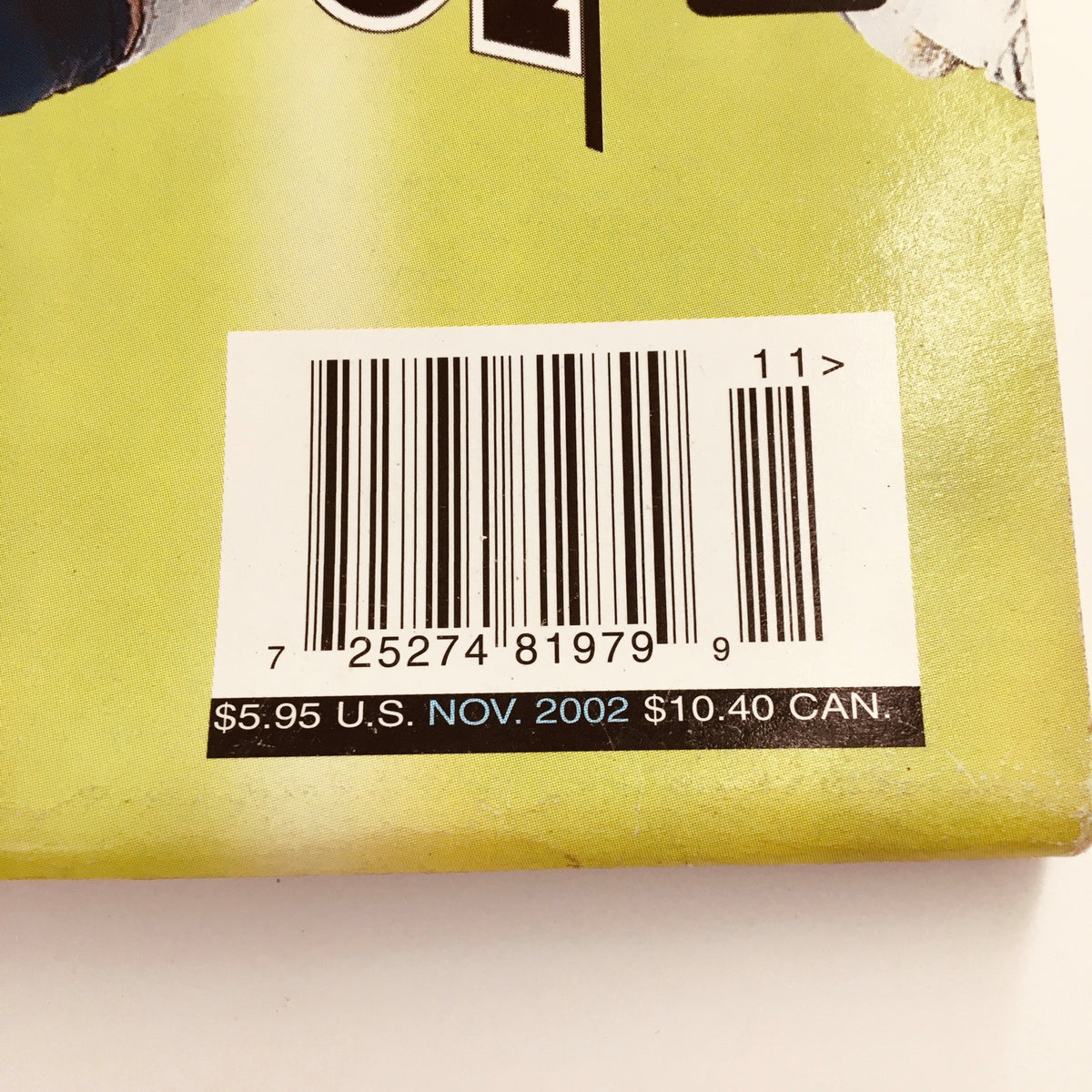 Close-up view of the barcode on Lee's Toy Review Magazine #121 November 2002 Sports Picks NFL Review, Newsstand, showcasing the pricing information and publication date.