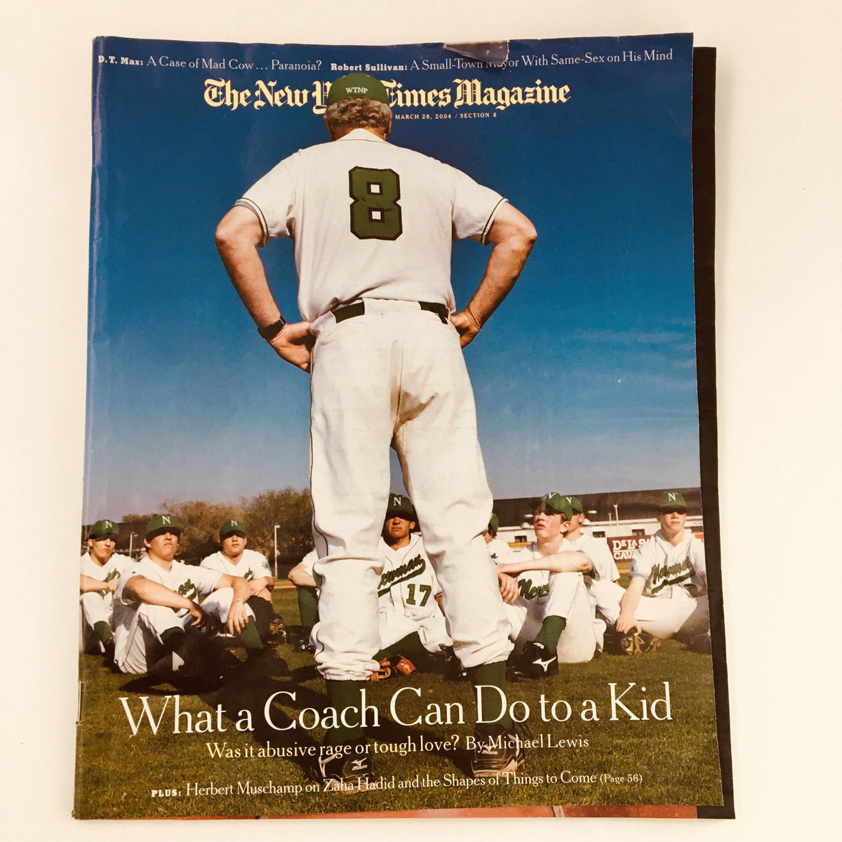 Cover of The New York Times Magazine March 28 2004 featuring a baseball coach in uniform, titled 'What a Coach Can Do to a Kid' by Michael Lewis, alongside a profile of Herbert Muschamp.