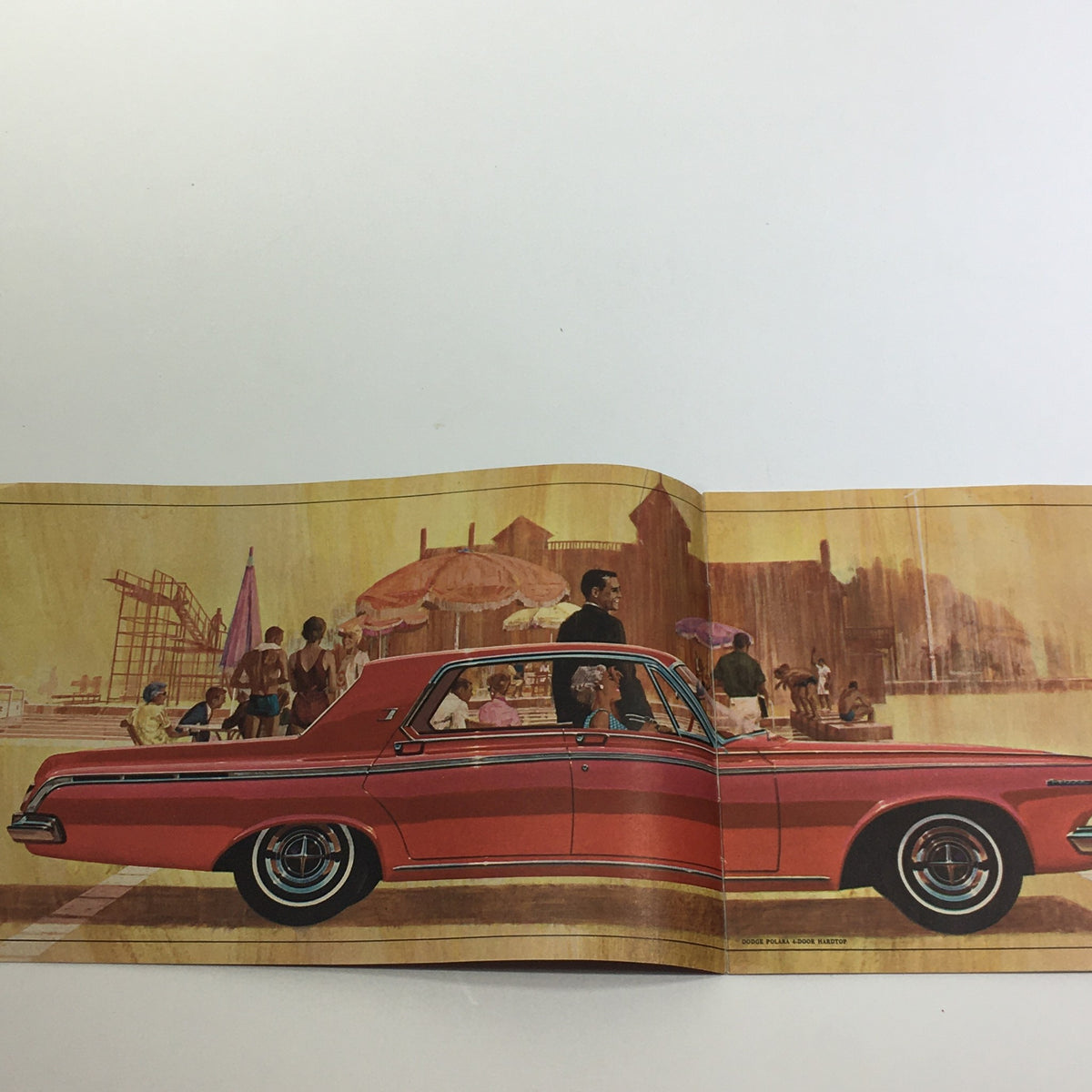 Interior page of the 1963 Dodge - Compact Dodge Dart - Standard Sz Dodge - Big Custom 880 Car Catalog featuring a red Dodge car with people enjoying the beach.