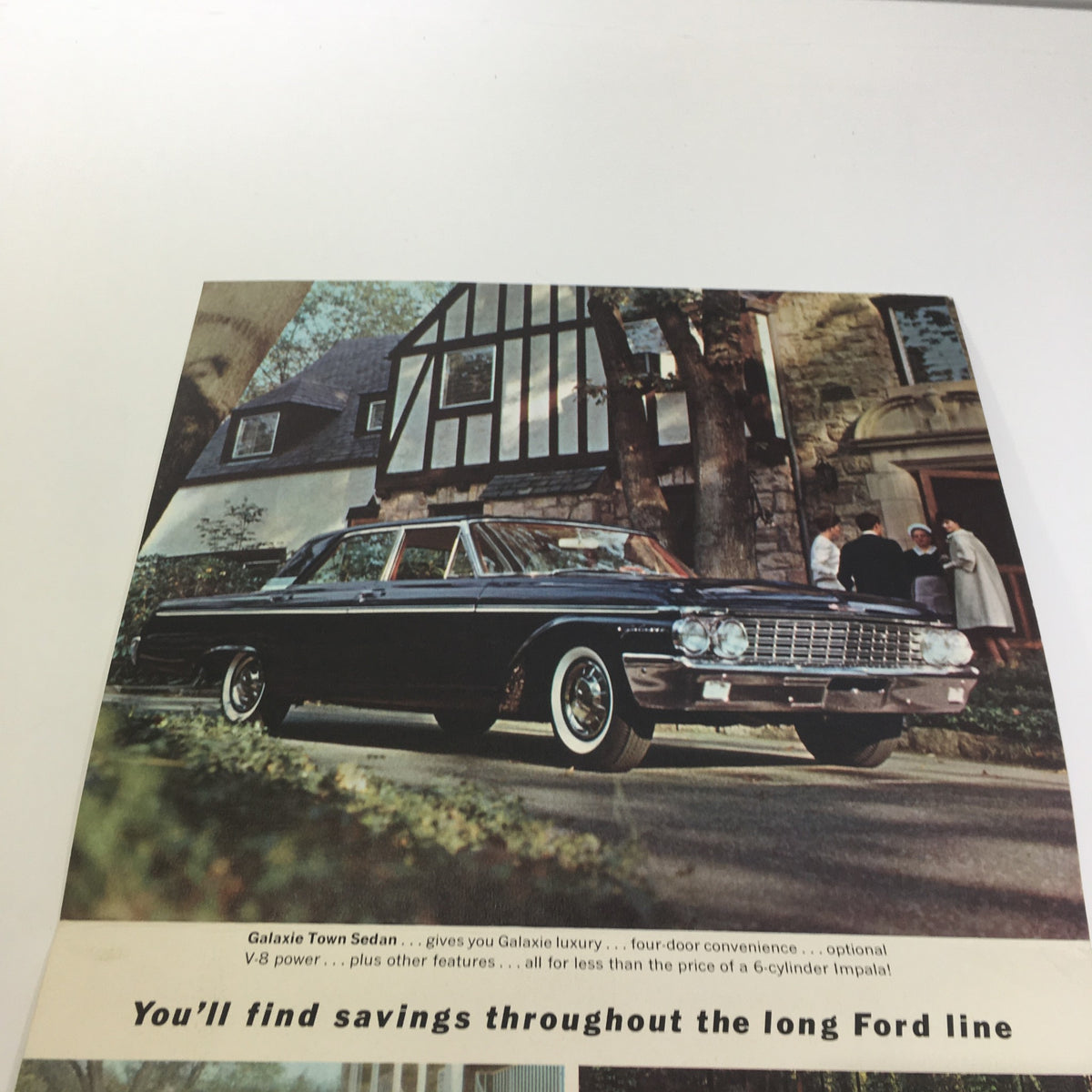 1962 Ford Galaxie Town 500 4-Door Sedan brochure featuring the car in a driveway near a charming home with a group of people gathered.