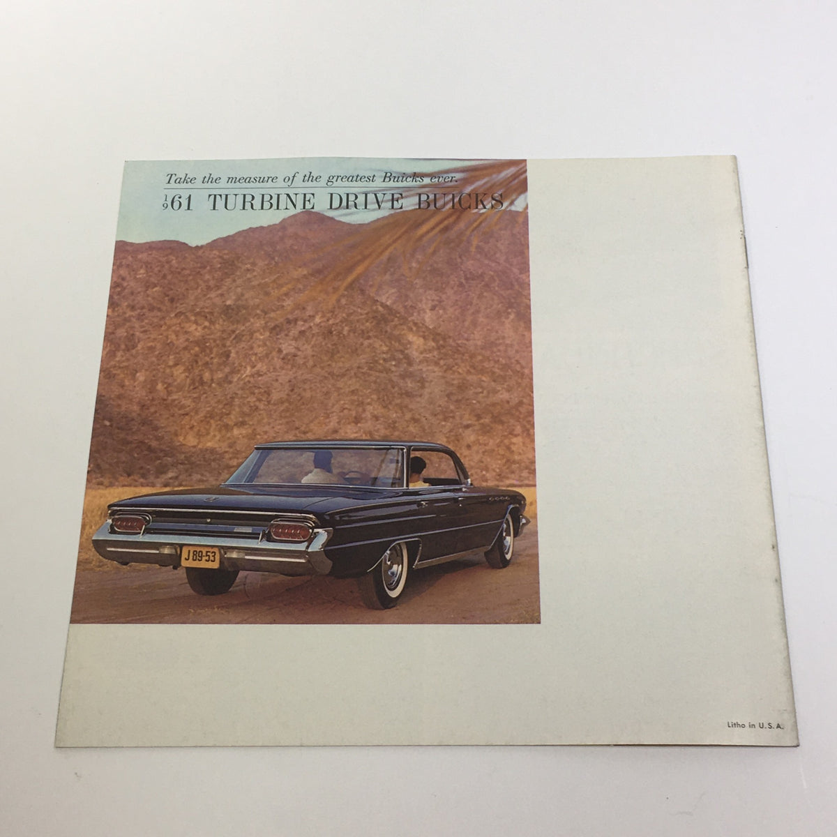 Back cover of the 1961 Turbine Drive Buicks Electra 225 catalog featuring the vehicle against a picturesque desert landscape.