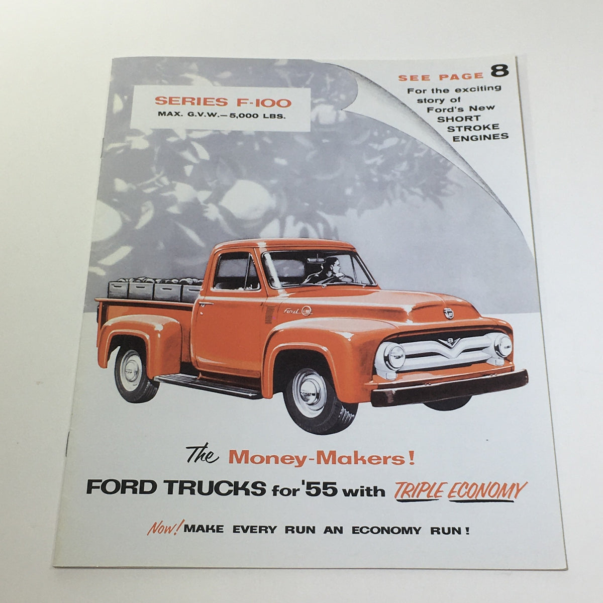 1955 Ford Trucks Series F-100 Heavy-Gage Steel Side Panels Car Catalog Brochure showcasing an orange Ford F-100 truck, highlighting its design and features, emphasizing its appeal to classic truck enthusiasts and collectors.