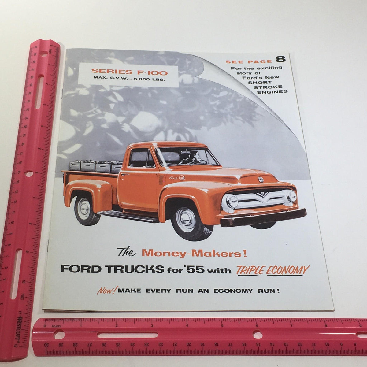 1955 Ford Trucks Series F-100 Heavy-Gage Steel Side Panels Car Catalog Brochure, showcasing a colorful illustration of the truck, emphasizing its features and fuel economy advantages.