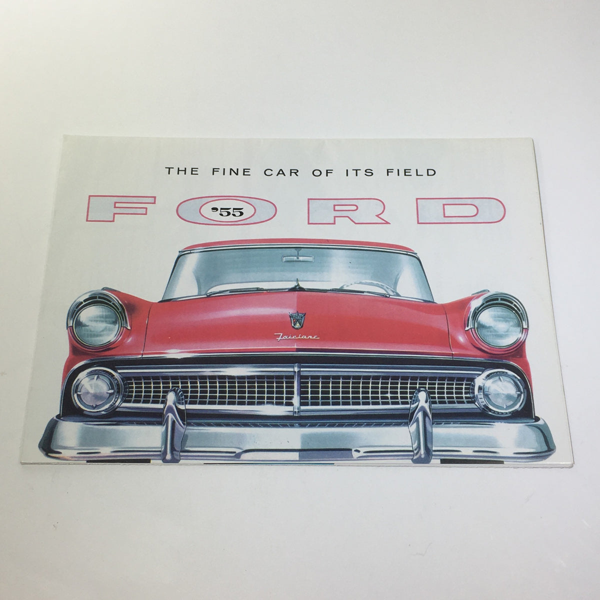 Front cover of the 1955 Ford Trigger-Torque Power Angle-Poised V-8 Engines Car Catalog Brochure featuring a classic Ford car design.