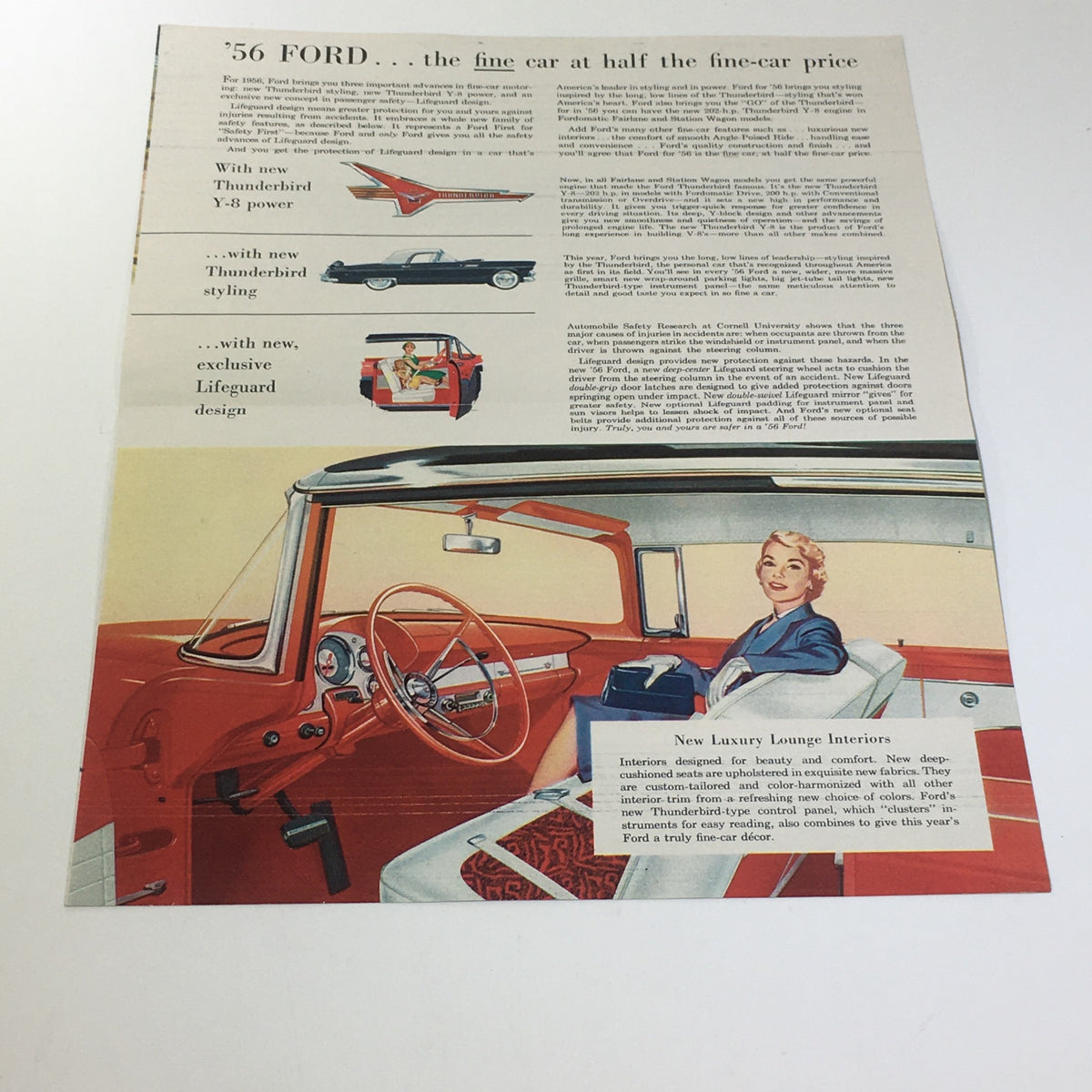 1956 Ford Thunderbird Y-8 Power Double-Swivel Lifeguard Mirror Car Catalog showcasing the interior design with a stylish woman seated, featuring dashboard and steering wheel details.