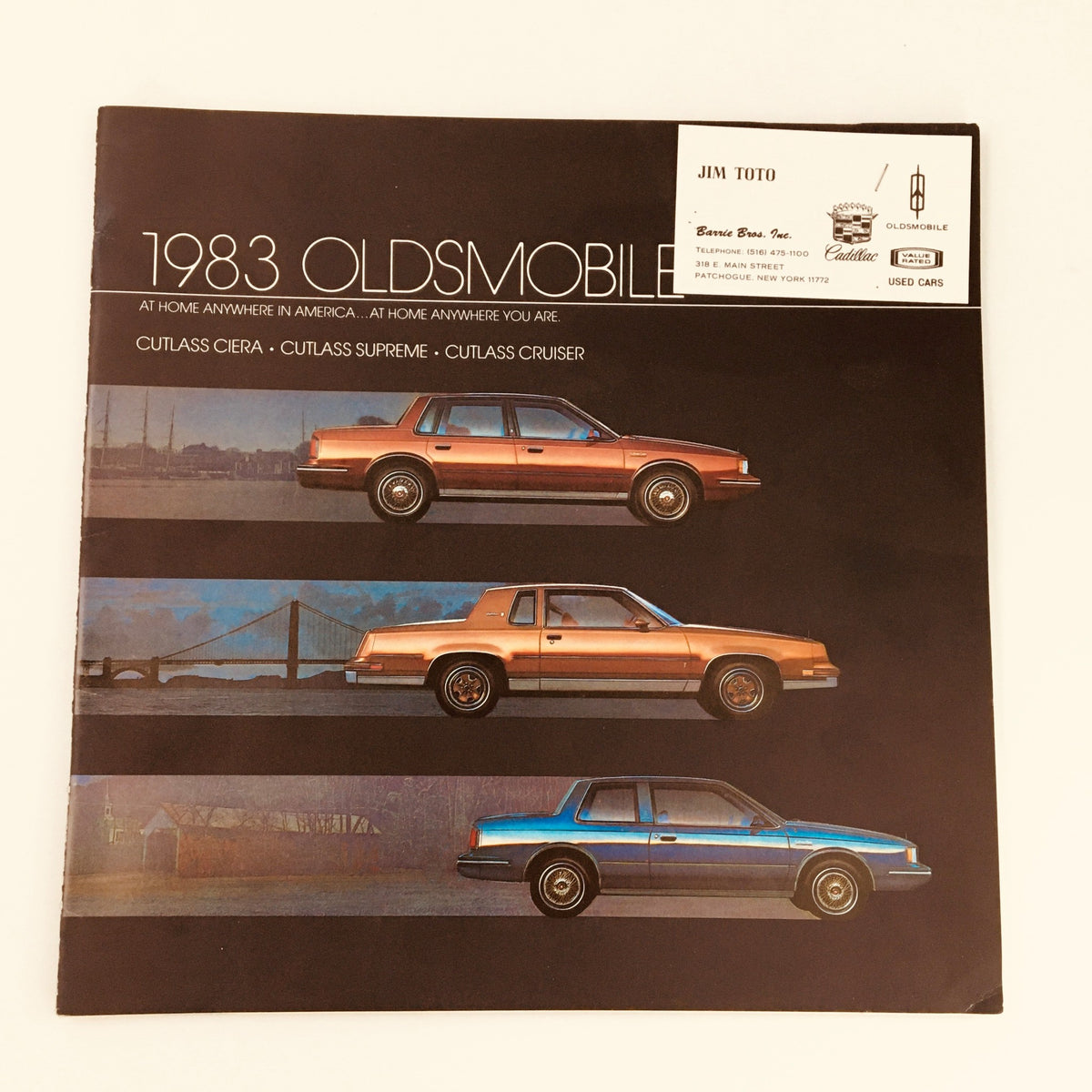 1983 Oldsmobile Cutlass Ciera, Supreme & Cruiser Feature Car Brochure Catalog cover showcasing three models with a scenic background.