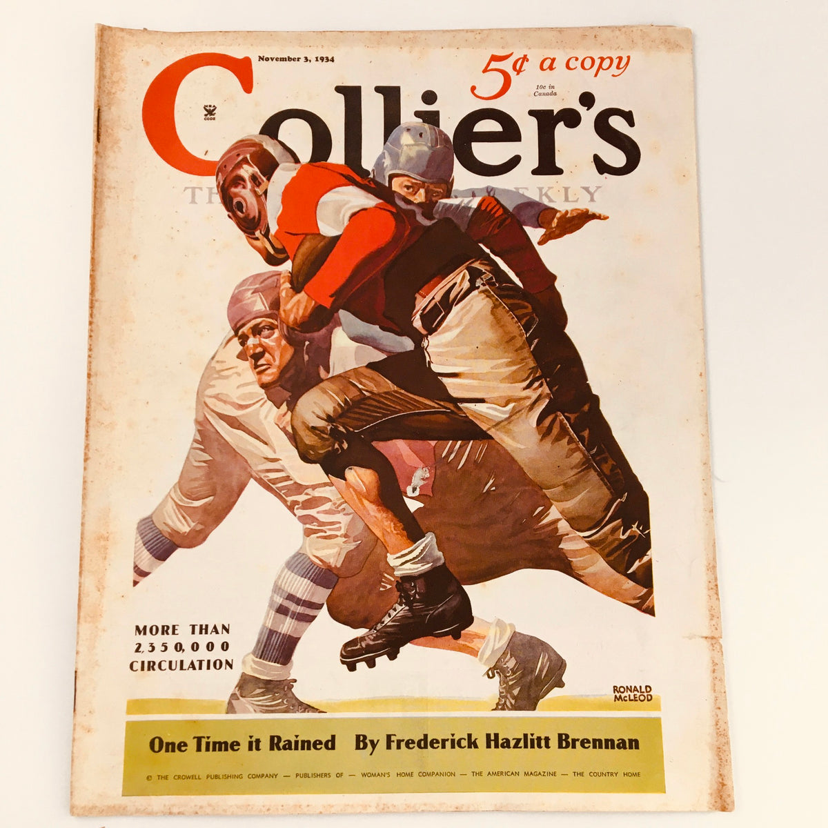 Vintage Collier's Magazine cover from November 3, 1934 featuring the title 'One Time It Rained' by Frederick H. Brennan, showcasing a dynamic sports illustration of football players.
