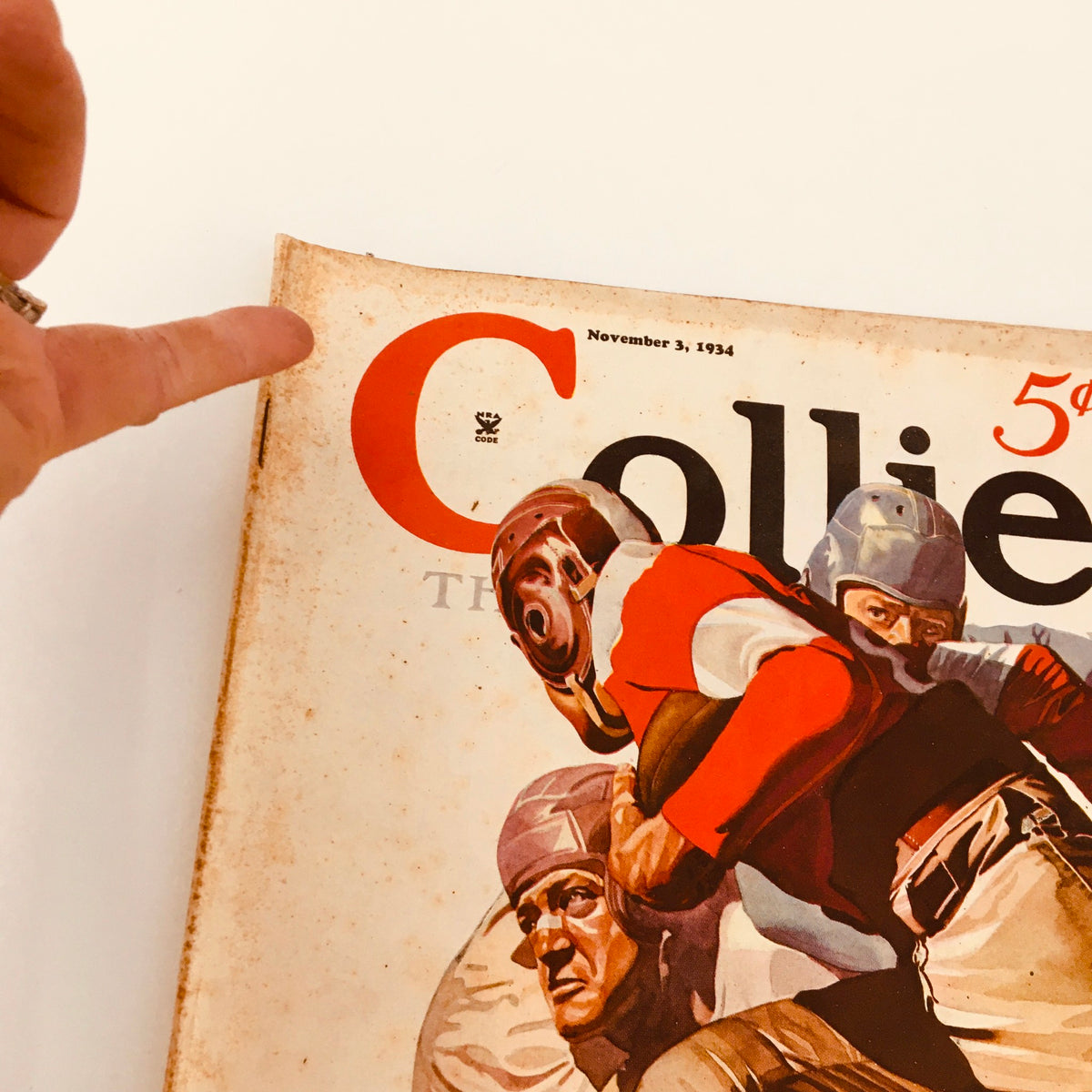 Close-up of the Vintage Collier's Magazine cover dated November 3, 1934, presenting the title 'One Time It Rained' by Frederick H. Brennan, with significant emphasis on the magazine's logo and artwork.