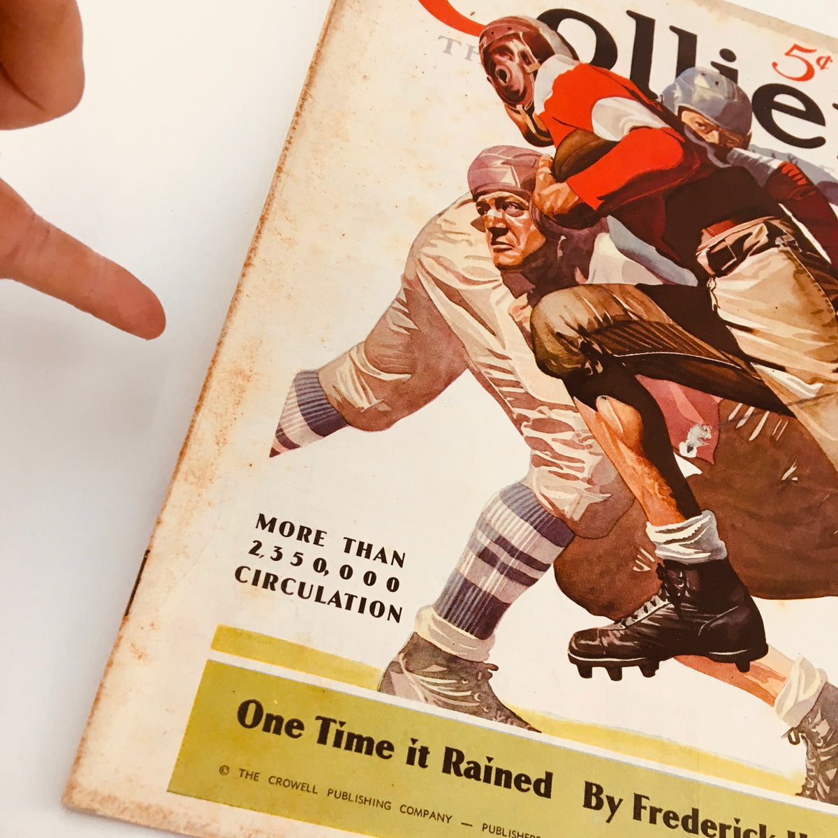 Closer inspection of the Vintage Collier's Magazine from November 3, 1934, displaying circulation information and the story title 'One Time It Rained' by Frederick H. Brennan.